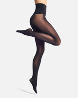 a woman in a bikini standing on a beach